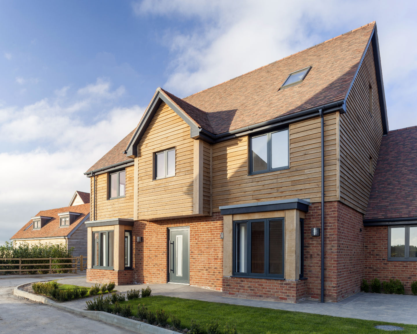 Visofold 4000 bifolding door in a luxurious living room with a grand piano